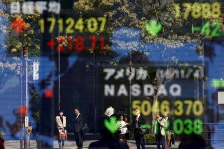 Asia Stocks Reach Record Highs After Wall St. Surge, Dollar Edges Back