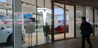 Tesla slides 3% in premarket, Li Auto sinks 8% as EV makers slash prices amid fierce competition