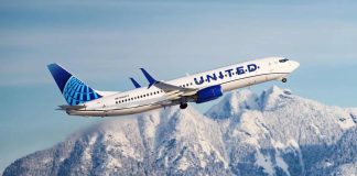 United Airlines reports $124 million loss in a quarter marred by grounding of some Boeing planes