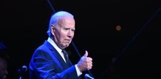 Biden long avoided touting stock market gains. Now he can’t resist.