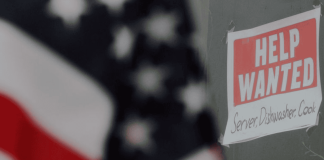 US job market hits milestone on long, strange trip back to pre-pandemic normal