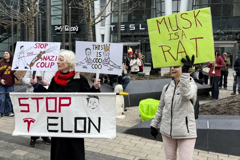 Anti-DOGE protests at Tesla stores target Elon Musk’s bottom line