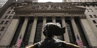 Stocks close mixed as Fed Chair Powell says economy is in “solid position”