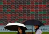 Asia shares slip, dollar steadies ahead of Jackson Hole