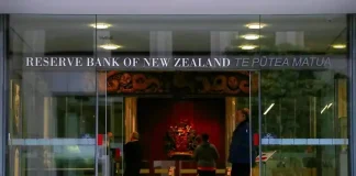NZ central bank cuts rates to 3-year low, flags more easing; kiwi $ tumbles