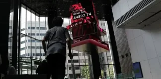 Stocks slump as Trump slaps new tariffs, Fed cut bets recede