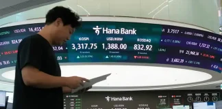 Asian shares are mostly up after US stocks inch to more records as inflation slows and Oracle soars