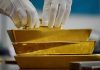 Long bond yields rise, gold hits record on fiscal concerns