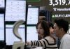Asian shares track Wall St’s rise as tech shares advance and investors shrug off the US shutdown