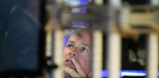 Wall Street’s feverish rally takes a break as US stocks and gold pull back from their records