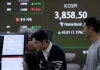 Asian shares slip on selling of tech stocks after a lackluster day on Wall Street