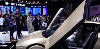 Tesla plans $20 billion capital spending spree in push beyond human-driven cars