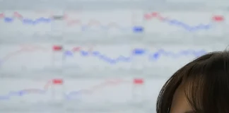 Asian shares are mixed after Wall Street’s strong start to the year cools