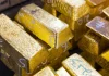Gold Retreats as Strong US Jobs Report Dims Rate-Cut Prospects