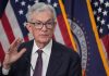 Federal Reserve holds interest rates steady, keeps 1 cut in play this year as uncertainty mounts