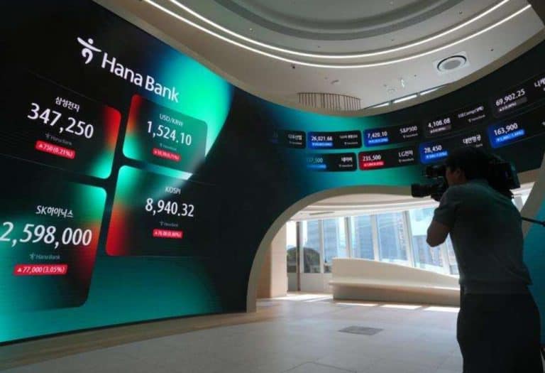 Asian shares shrug off Wall St blues following signing of US-Iran deal on ending the war